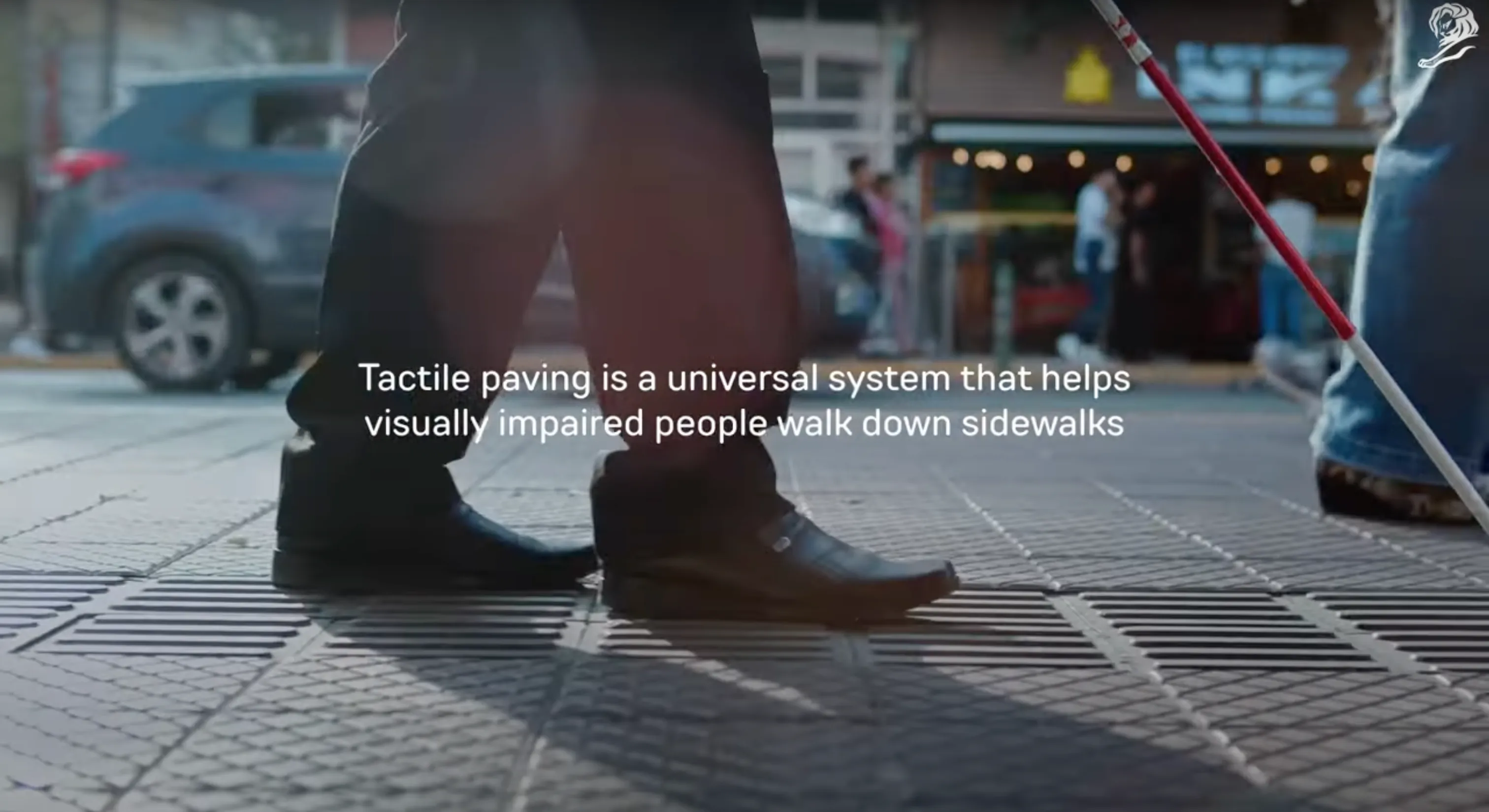 The bottom image shows a close-up of feet walking on a sidewalk with tactile paving, aiding visually impaired individuals. A person with a white cane is visible in the background, highlighting accessibility. White text reads: "Tactile paving is a universal system that helps visually impaired people navigate sidewalks."